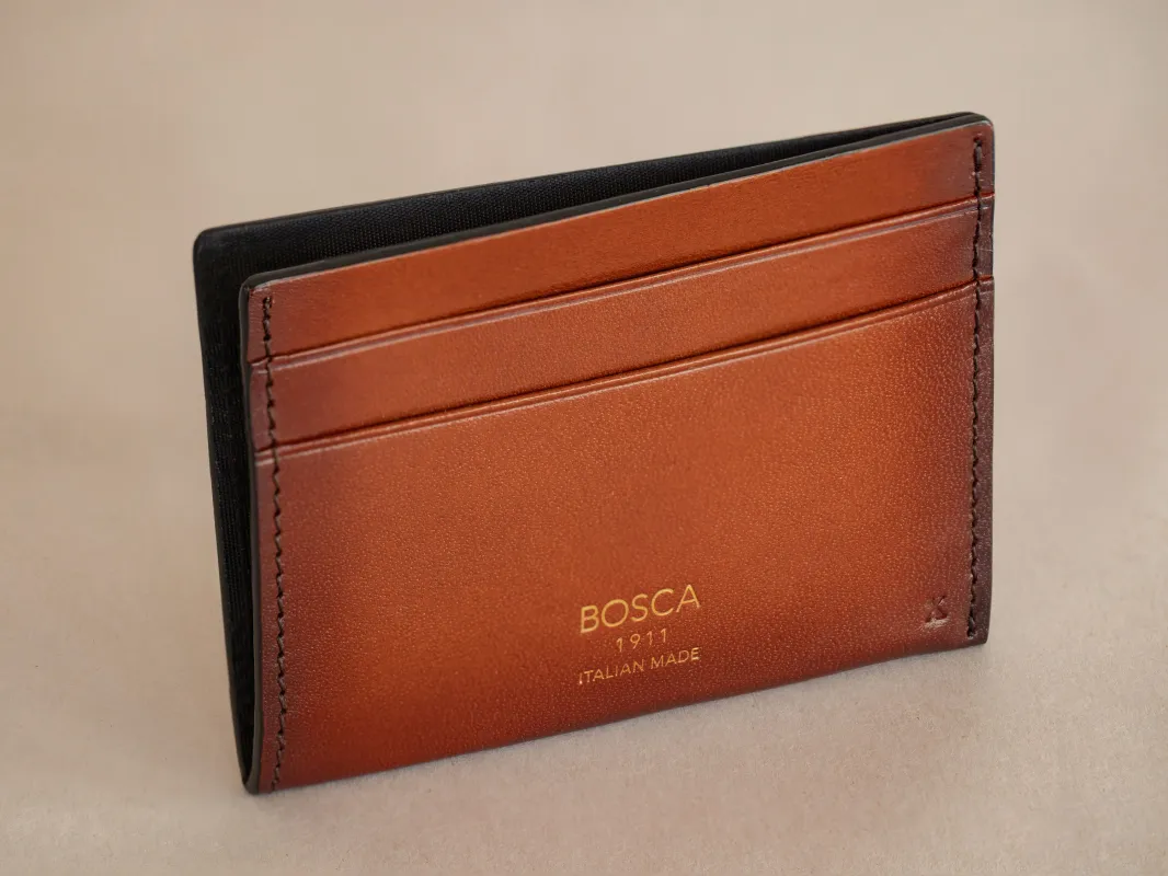 Smoked Old Leather Weekend Wallet sold by Bosca