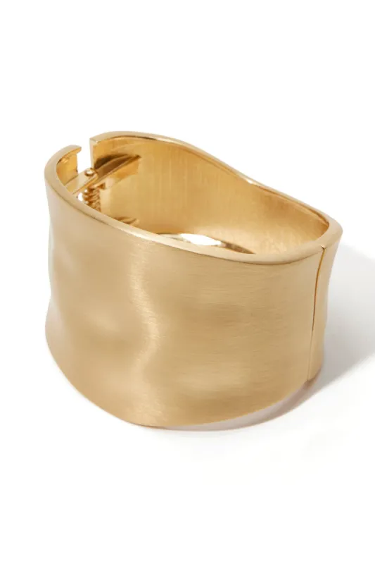 Gold Hammered Cuff Gold sold by Boston Proper