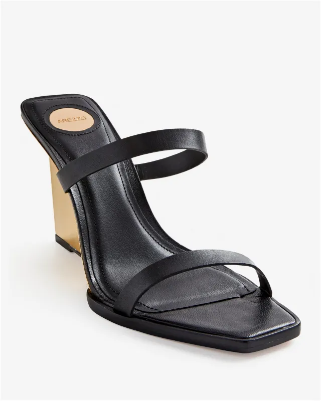 Metallic Heeled Wedge Black sold by Boston Proper