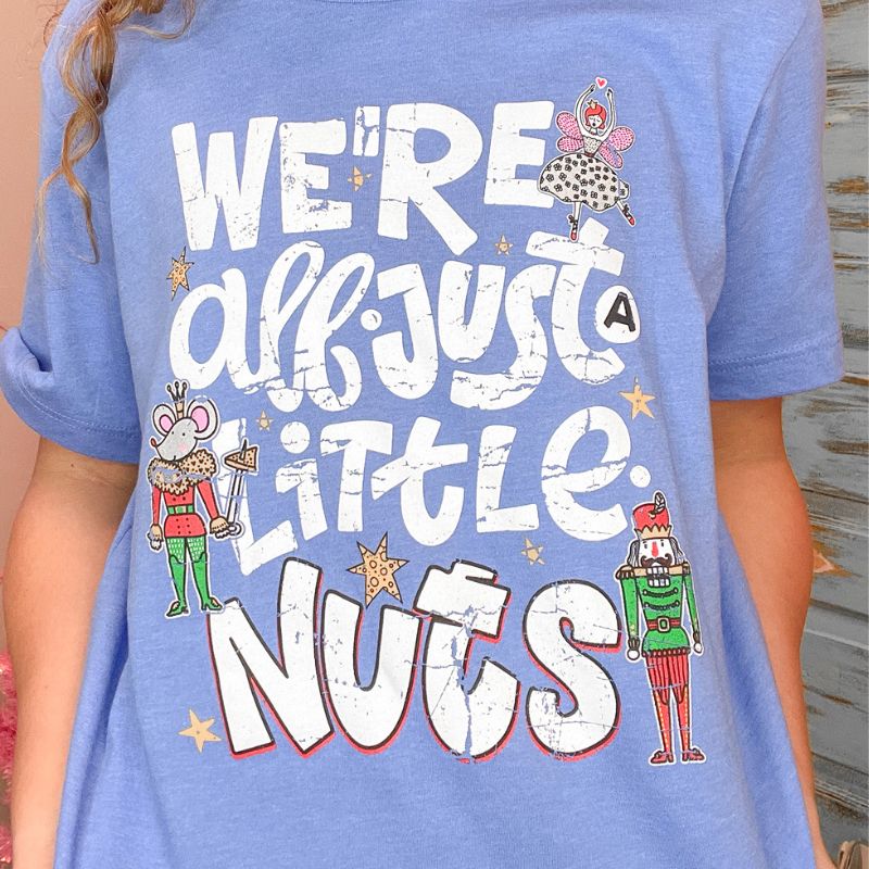 Christmas We're All Just a Little Nuts Graphic Tee sold by Boujee Boutique product image thumbnail 3