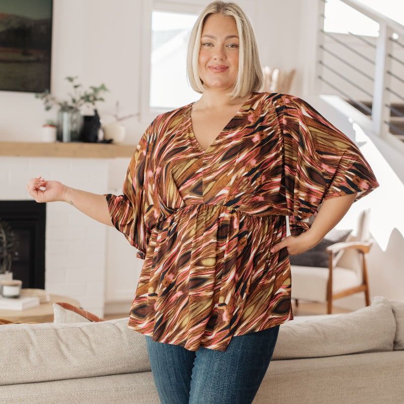 Dearest Dreamer Peplum Top in Abstract Mocha sold by Boujee Boutique