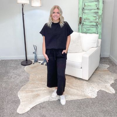 Black Textured Short Sleeve Top sold by Boujee Boutique