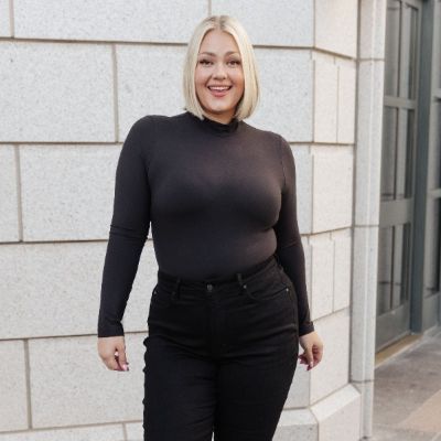 Simple Situation Mock Neck Black Bodysuit sold by Boujee Boutique