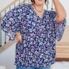 Dearest Dreamer Purple Peplum Top in Navy Floral sold by Boujee Boutique