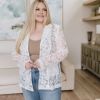 White Eloquent and Elevated Lace Blazer sold by Boujee Boutique