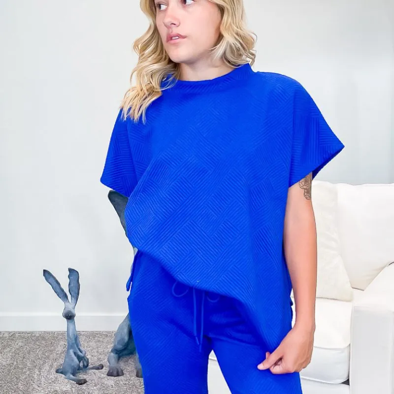 Royal Blue Textured Short Sleeve Top sold by Boujee Boutique