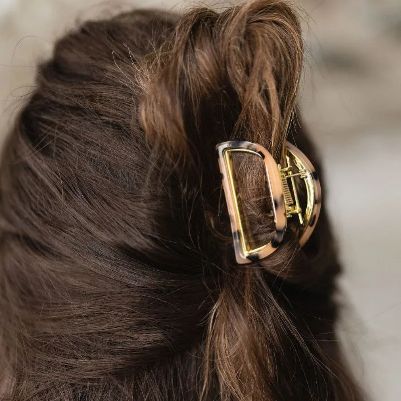 Tortoise Half Moon Claw Clip sold by Boujee Boutique