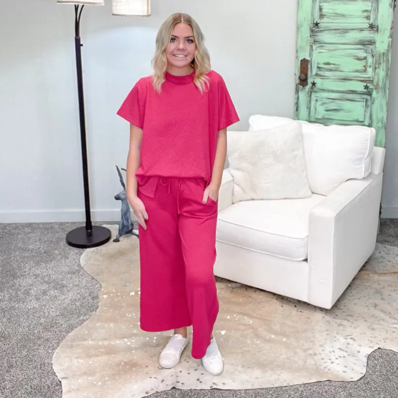 Deep Pink Textured Short Sleeve Top sold by Boujee Boutique