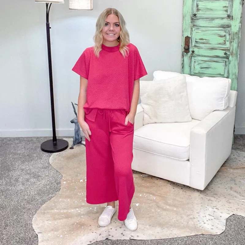 Deep Pink Textured Short Sleeve Top sold by Boujee Boutique