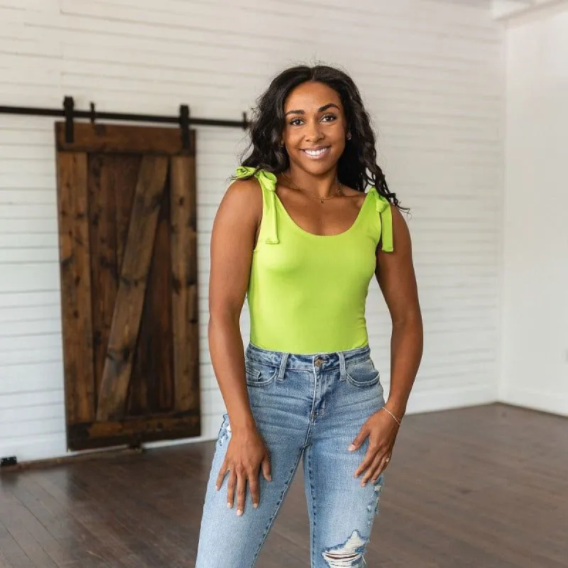 Just a Spritz Sleeveless Bodysuit in Lime sold by Boujee Boutique