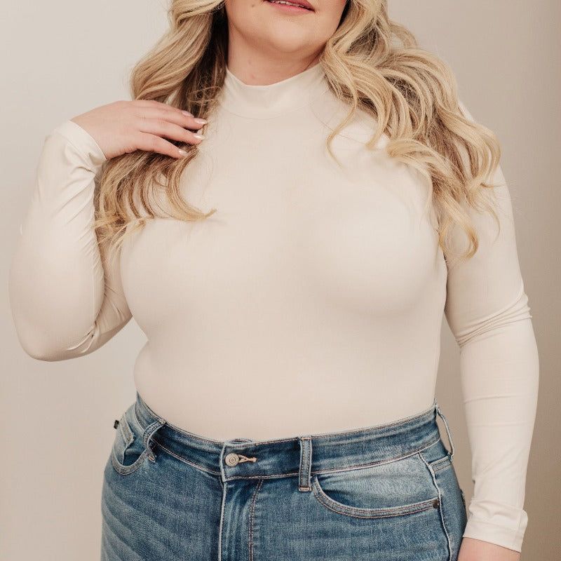 Simple Situation Mock Neck Bodysuit in White/Cream sold by Boujee Boutique