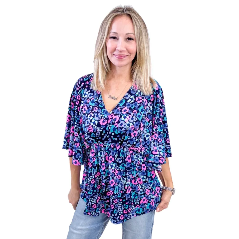 Dear Scarlett Dreamer Peplum Top in Navy and Lavender Animal Print sold by Boujee Boutique