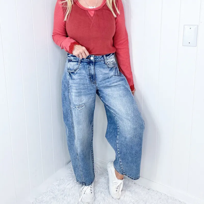 Cello Distressed Mid Rise Barrel Leg Jeans With Side Panels In a Medium Wash sold by Boujee Boutique