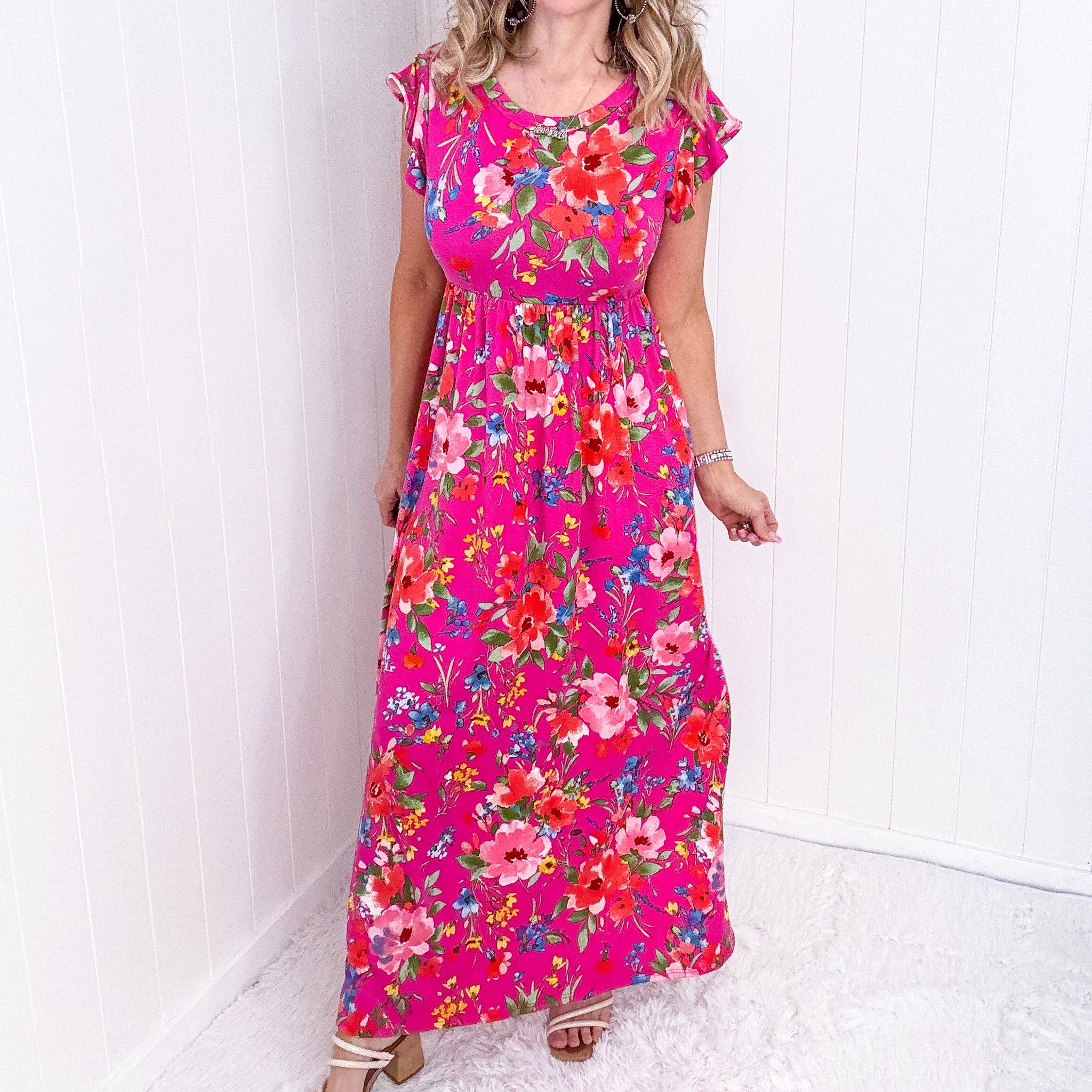 Fuchsia Floral Fit and Flare Maxi Dress sold by Boujee Boutique