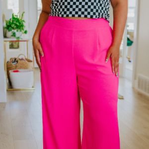 I Love These High Rise Wide Leg Pants in Hot Pink sold by Boujee Boutique