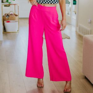 I Love These High Rise Wide Leg Pants in Hot Pink sold by Boujee Boutique