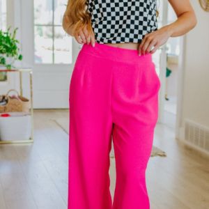 I Love These High Rise Wide Leg Pants in Hot Pink sold by Boujee Boutique