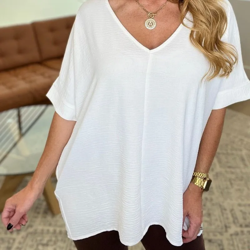 Crinkle Woven V-Neck Dolman Sleeve Top in Off White sold by Boujee Boutique
