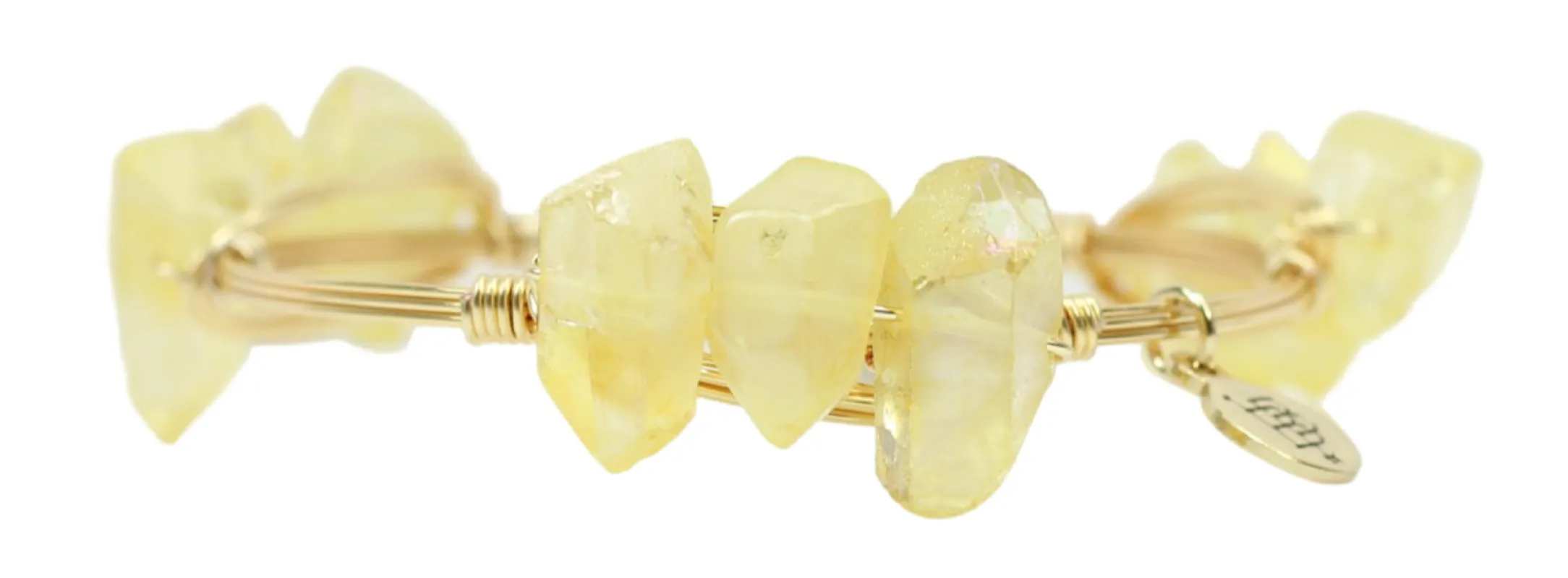 The Birdie Bangle Bracelet sold by Bourbon and Bowties