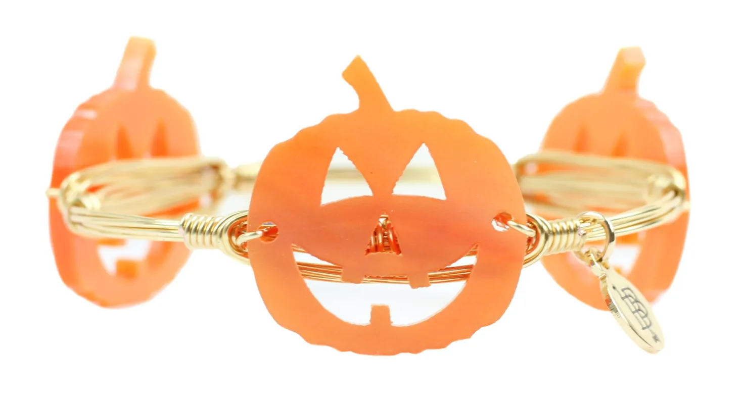The Jack-O-Lantern Bangle Bracelet sold by Bourbon and Bowties