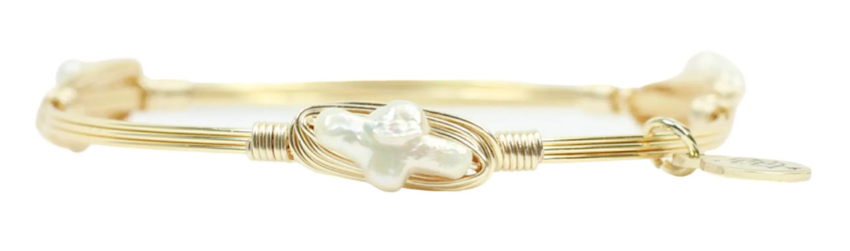 The Pearl Cross Bangle Bracelet sold by Bourbon and Bowties