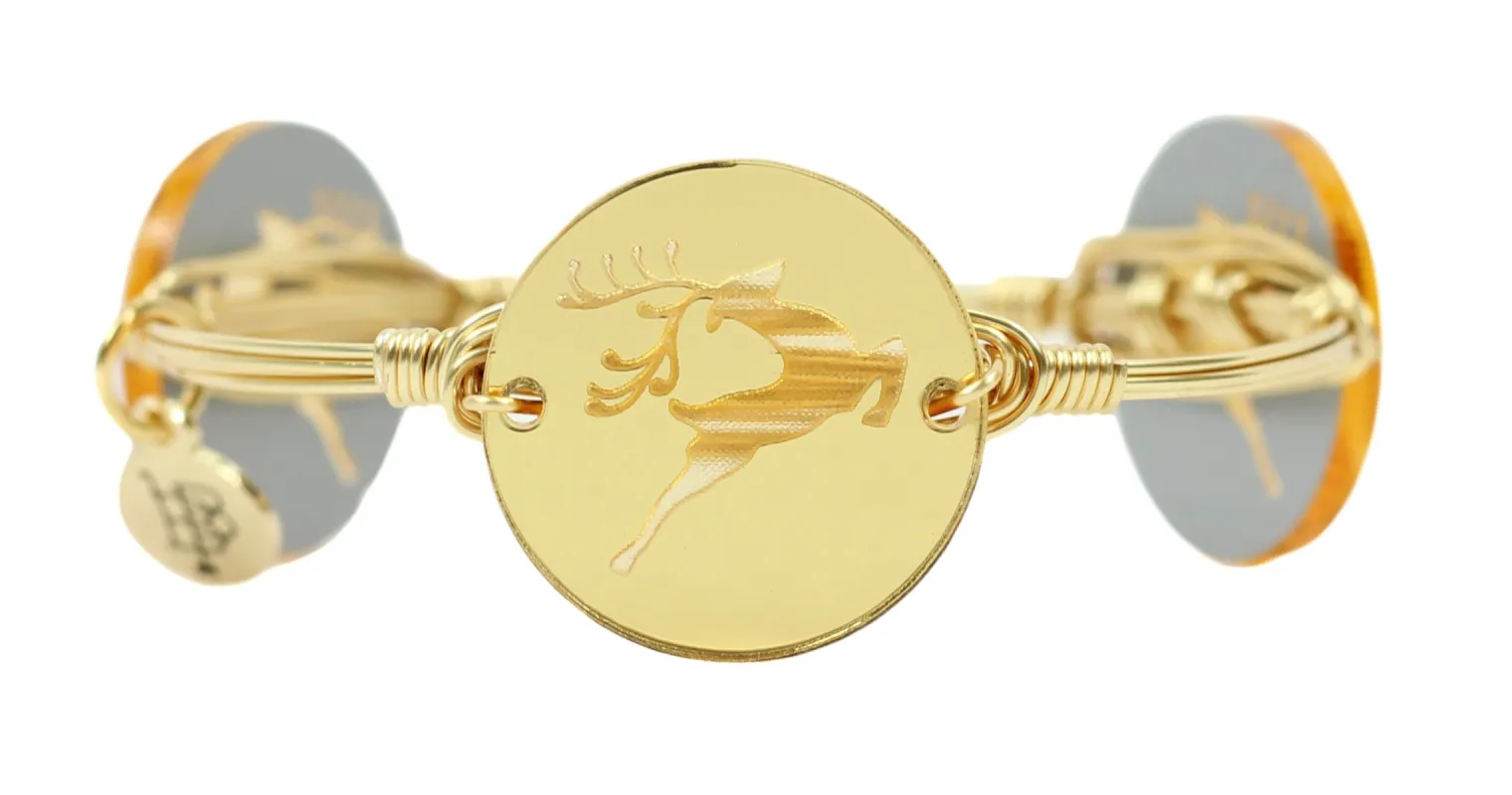 The Gold Reindeer Bangle Bracelet sold by Bourbon and Bowties