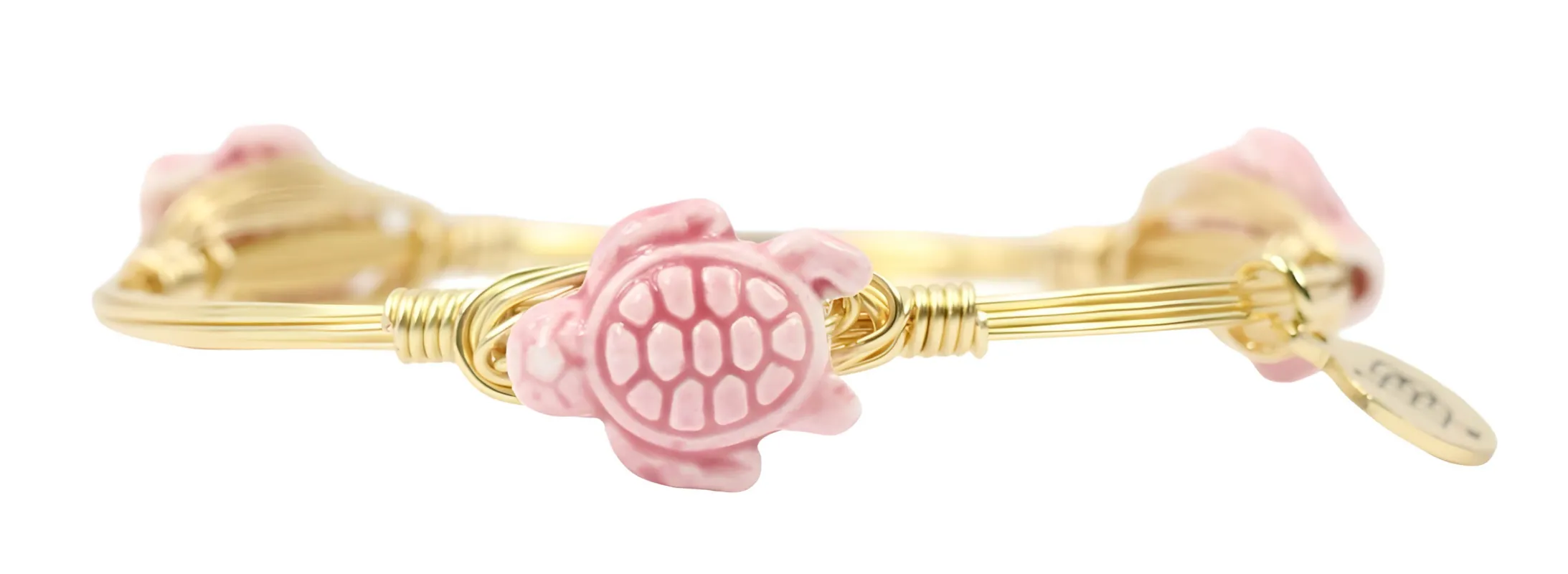 The Pink Turtle Bangle Bracelet sold by Bourbon and Bowties