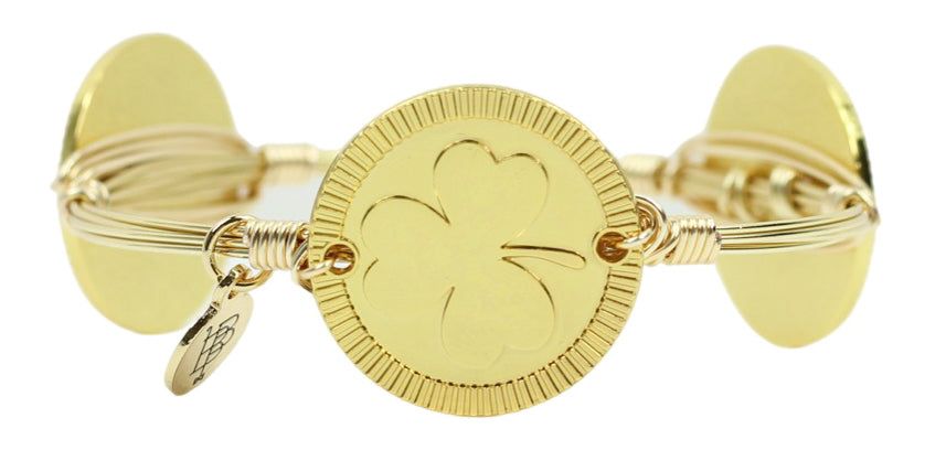 The Gold Shamrock Bangle Bracelet sold by Bourbon and Bowties