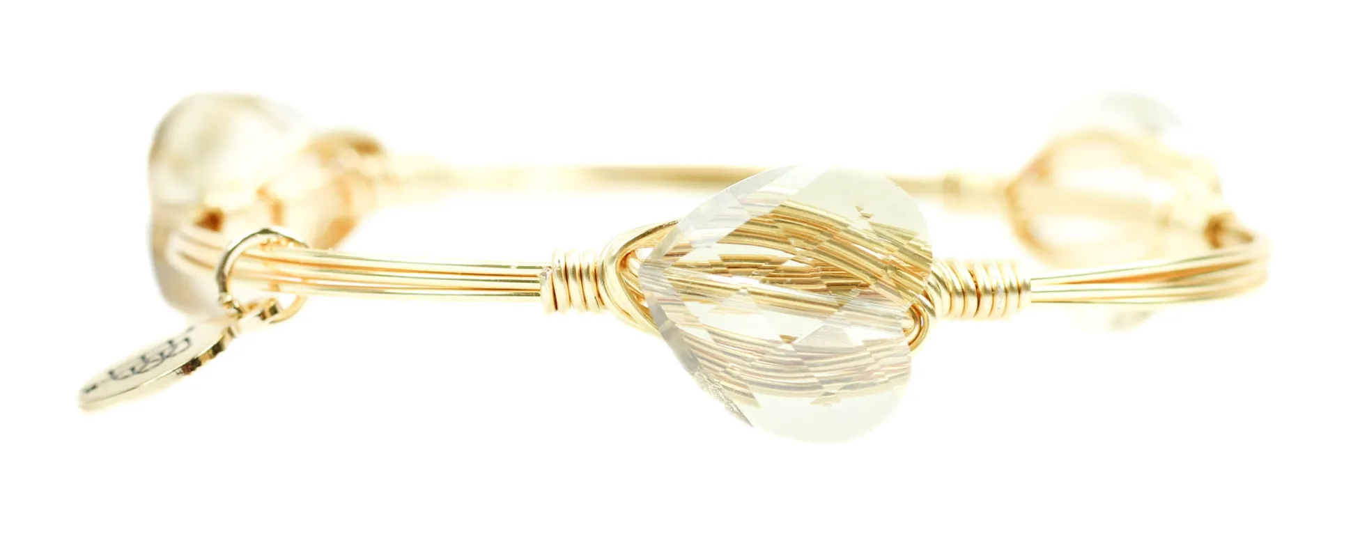 The Champagne Heart Bangle Bracelet sold by Bourbon and Bowties