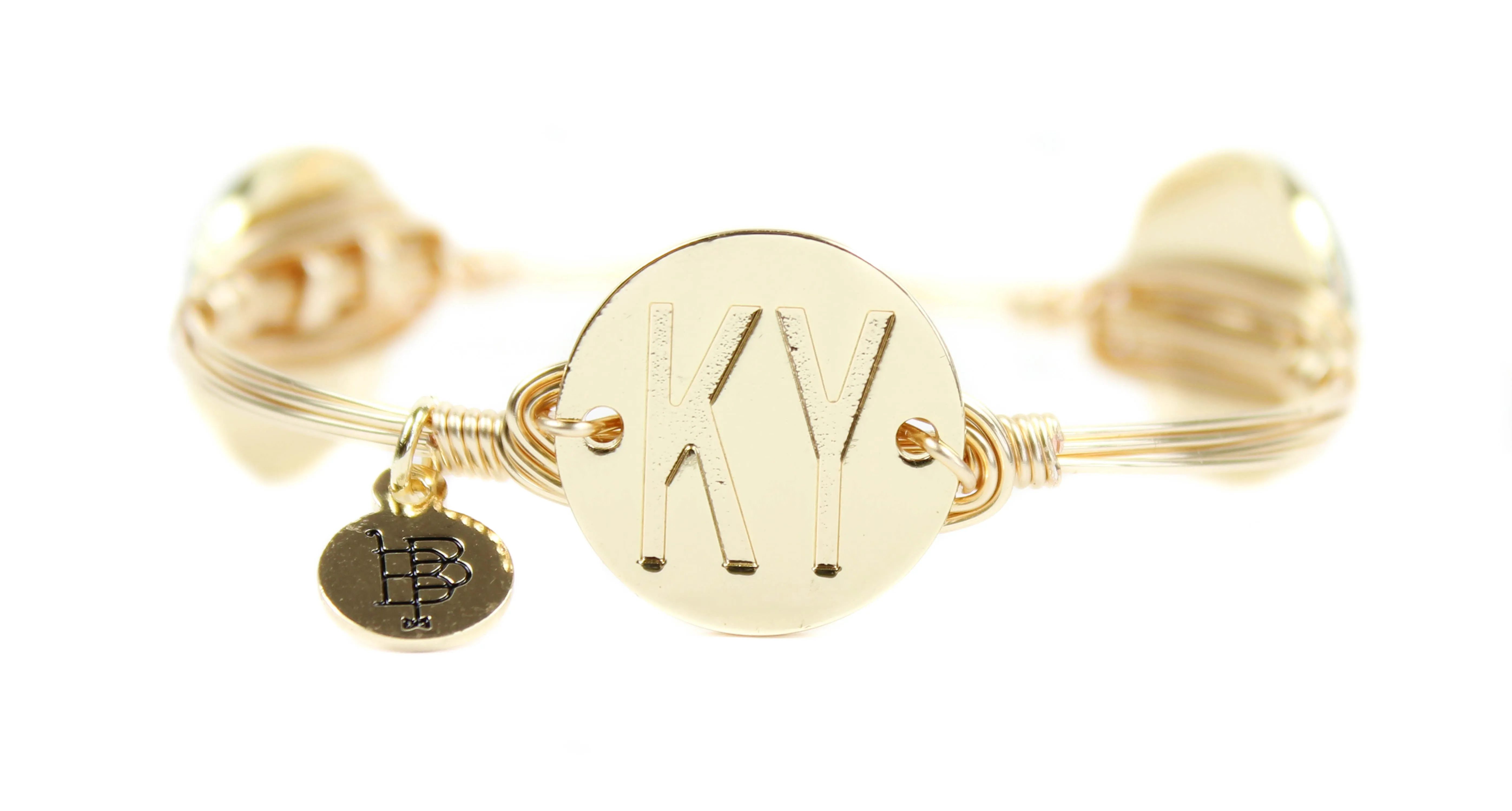 The Gold Kentucky Initial Bangle Bracelet sold by Bourbon and Bowties