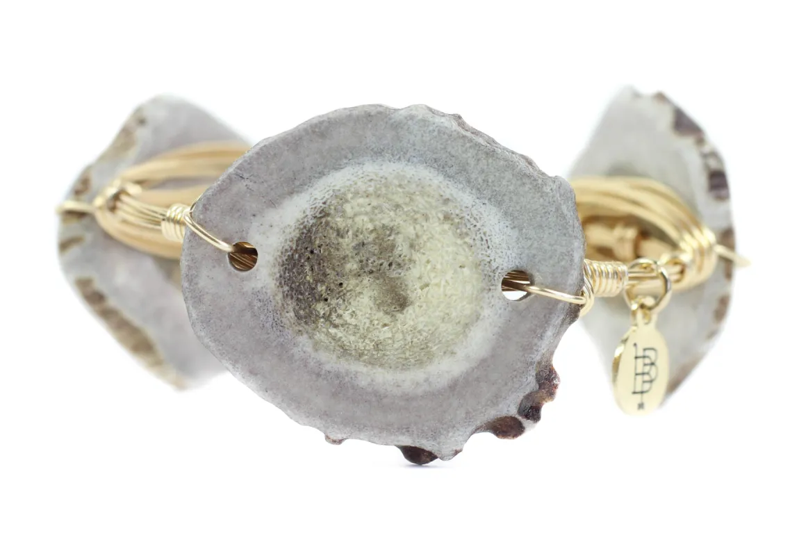 The Antler Sliced Bangle Bracelet sold by Bourbon and Bowties