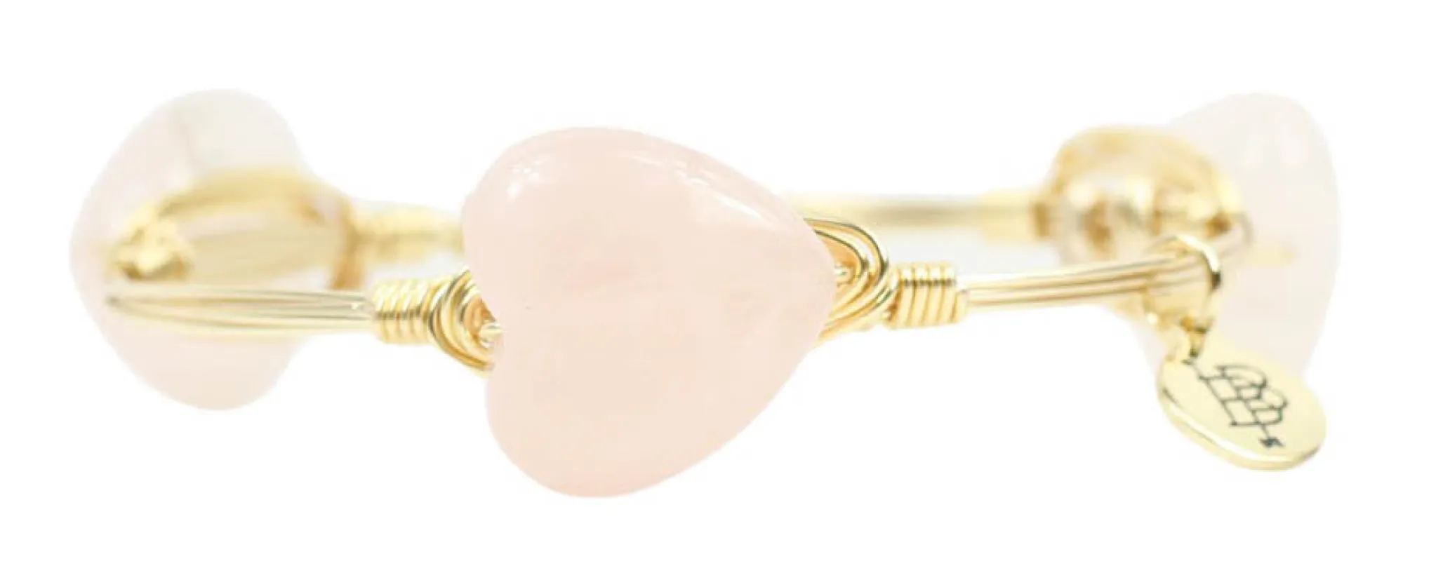 The Rose Quartz Heart Bangle Bracelet sold by Bourbon and Bowties