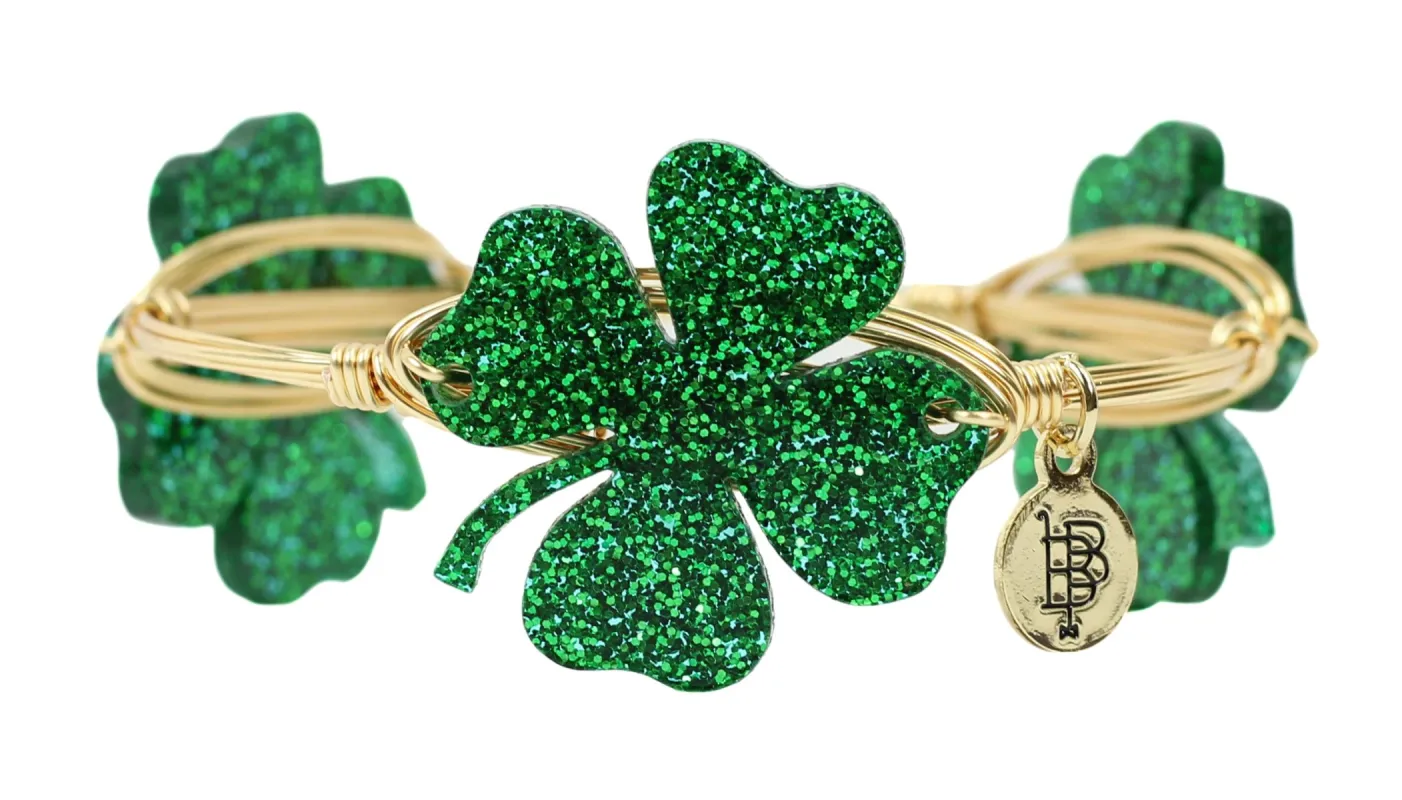 The Glitter Shamrock Bangle Bracelet sold by Bourbon and Bowties