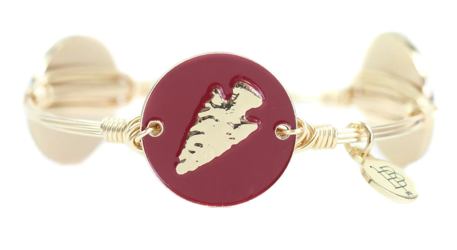 The Garnet Arrow Bangle Bracelet sold by Bourbon and Bowties