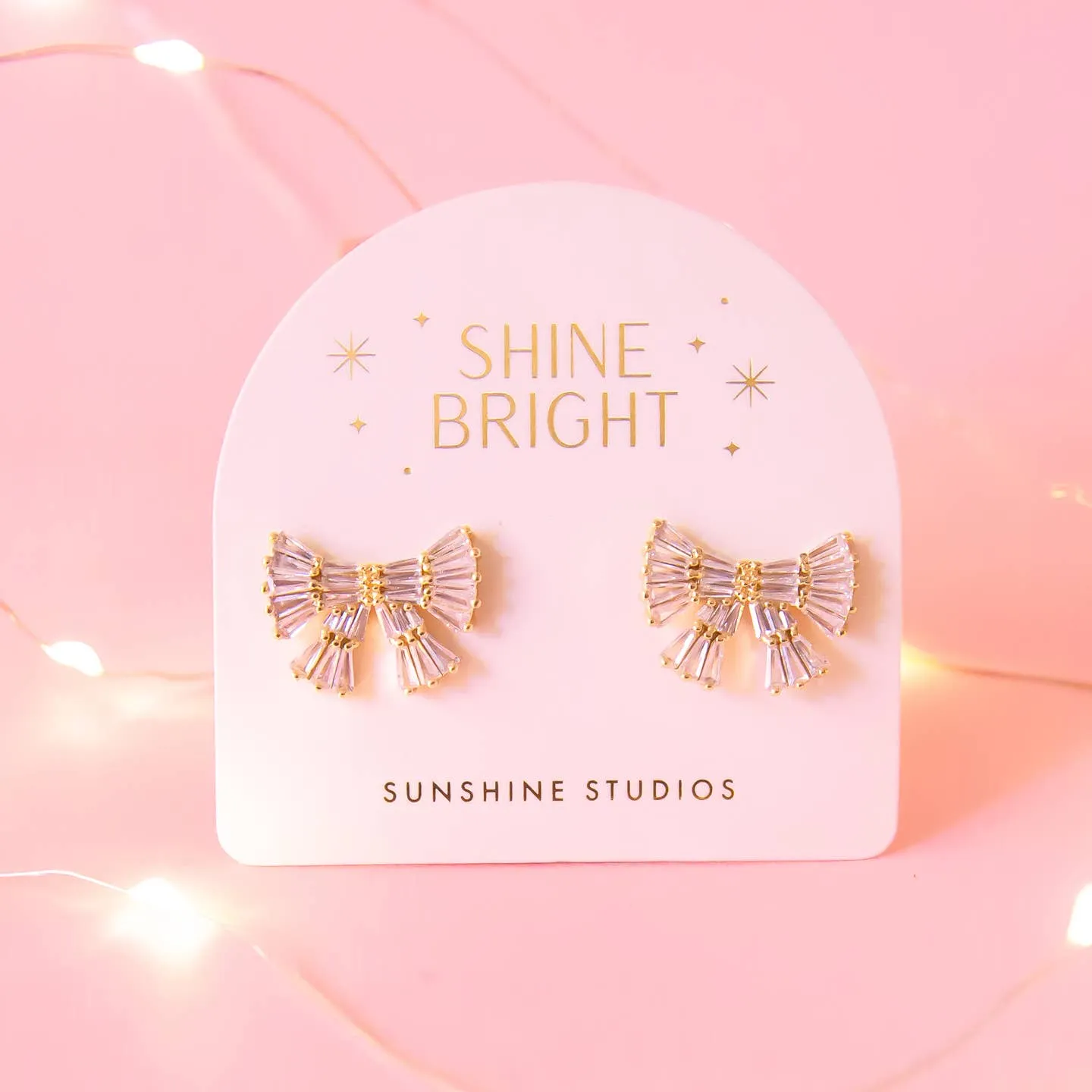 Sunshine Studios Holiday Sparkle Bow Earrings sold by Boutique with Grace product image thumbnail 3