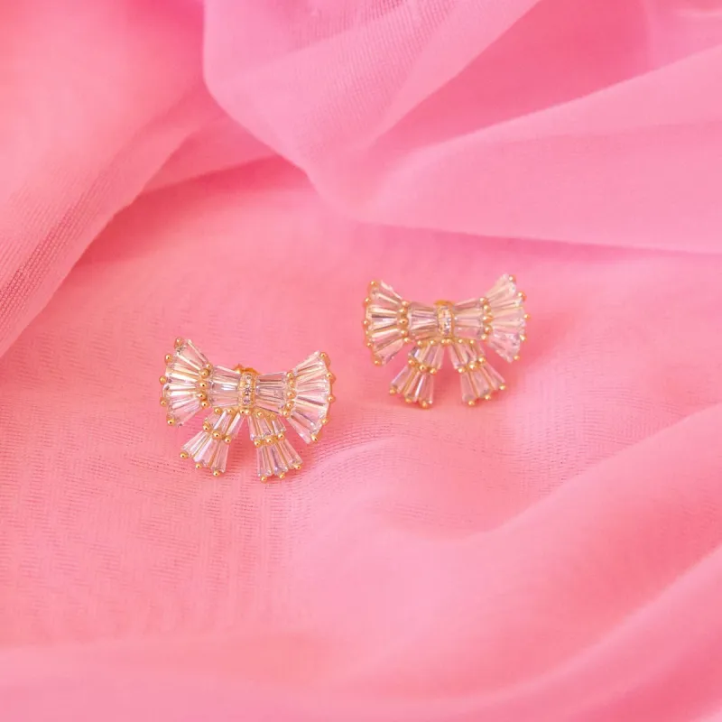 Sunshine Studios Holiday Sparkle Bow Earrings sold by Boutique with Grace