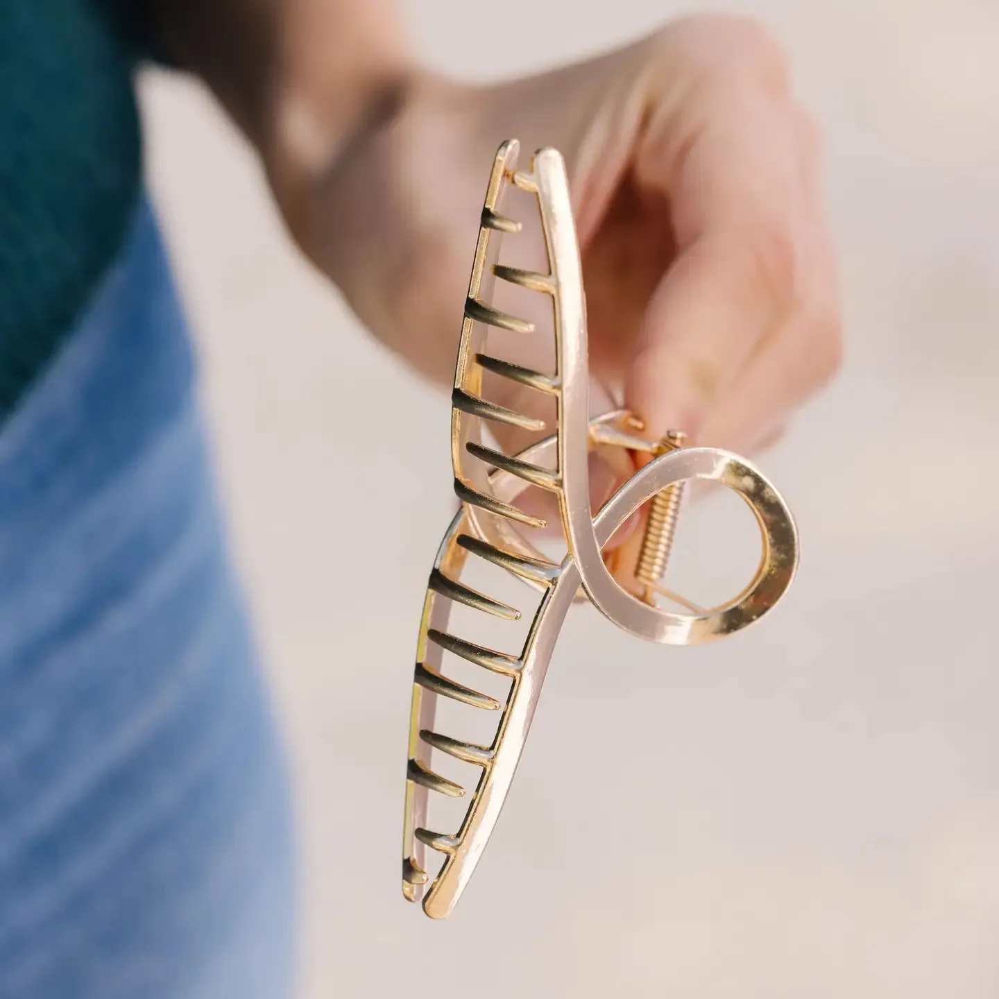 ANDi Gold Swirl Claw Clip sold by Boutique with Grace product image thumbnail 4