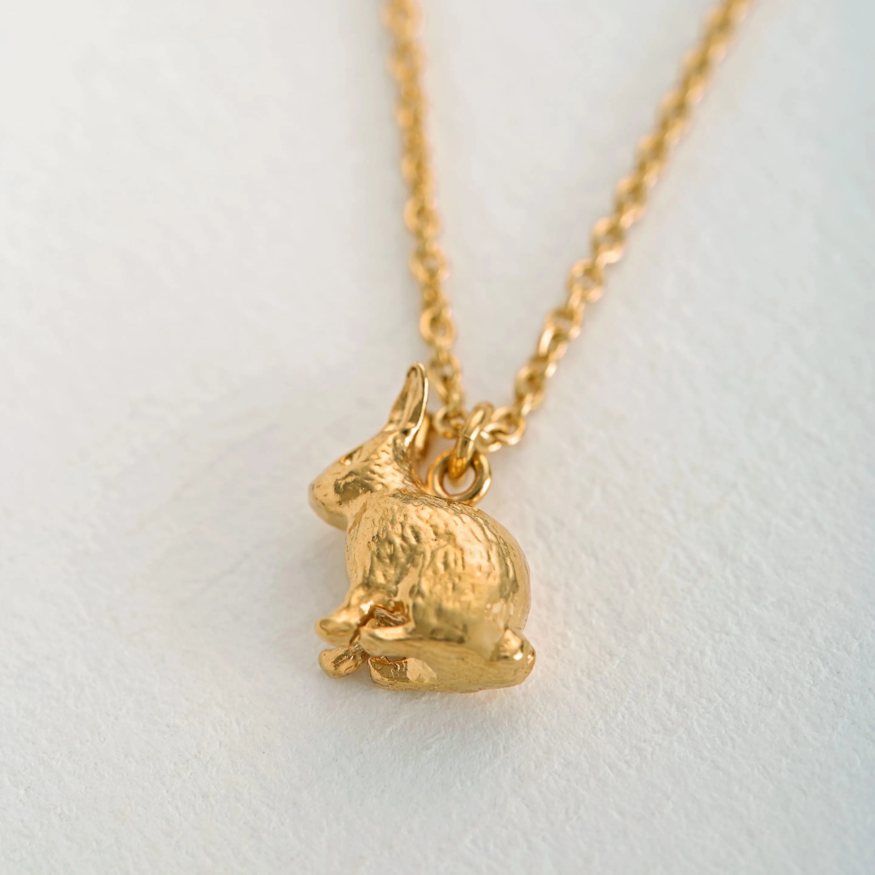 Alex Monroe Gold Sitting Bunny Necklace sold by Boutique with Grace