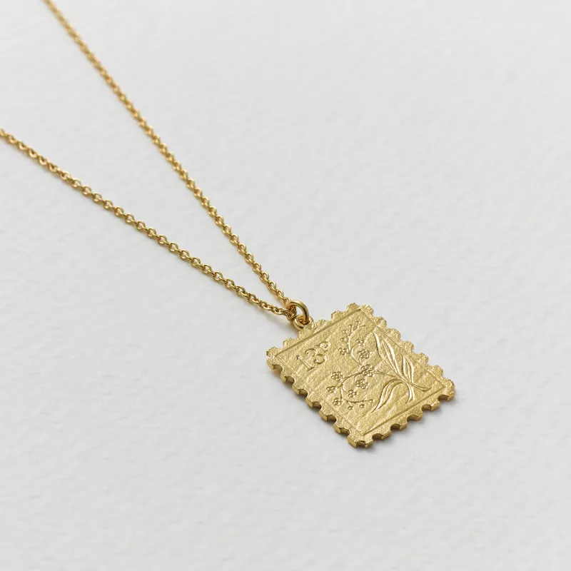 Alex Monroe Gold Floral Stamp Necklace sold by Boutique with Grace