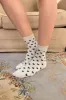 Hearts Socks sold by Brandy Melville