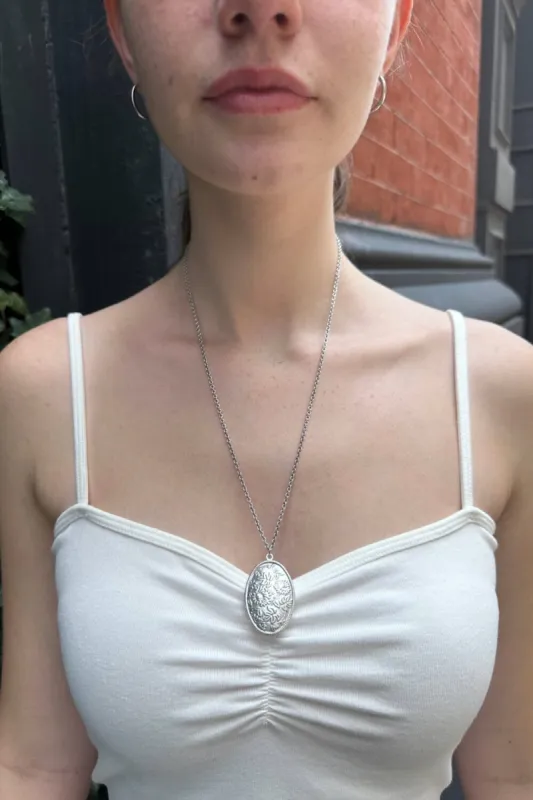 Oval Floral Charm Necklace sold by Brandy Melville