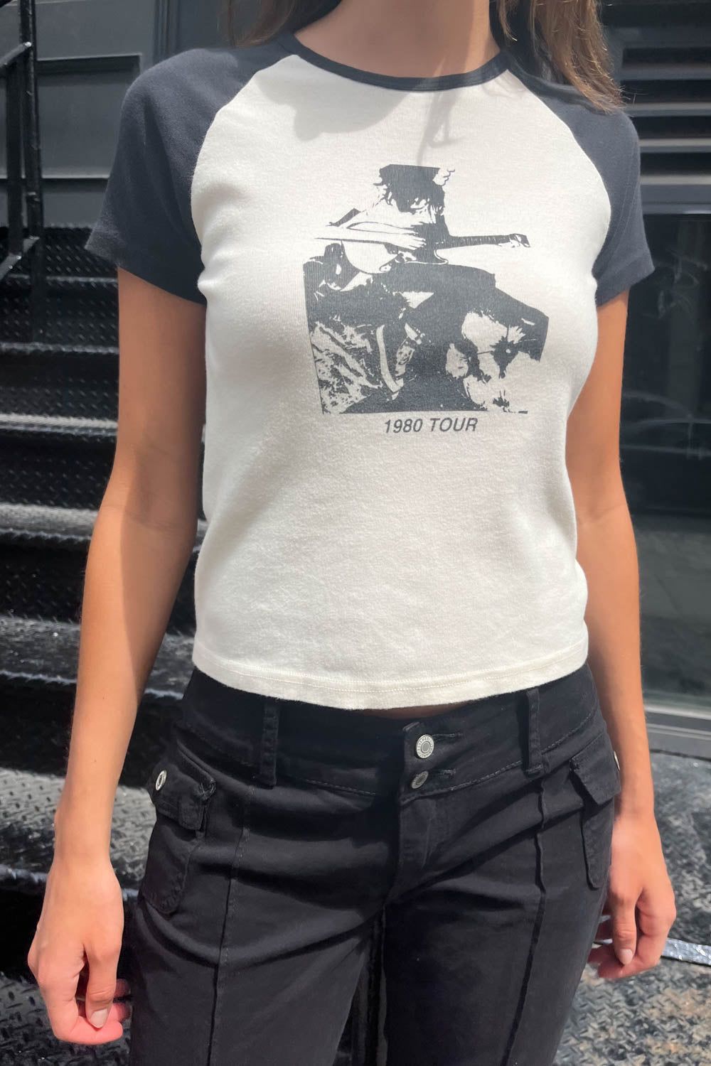 Bella 1980 Tour Top sold by Brandy Melville