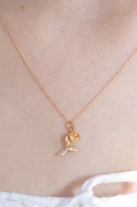 Rose Charm Necklace sold by Brandy Melville