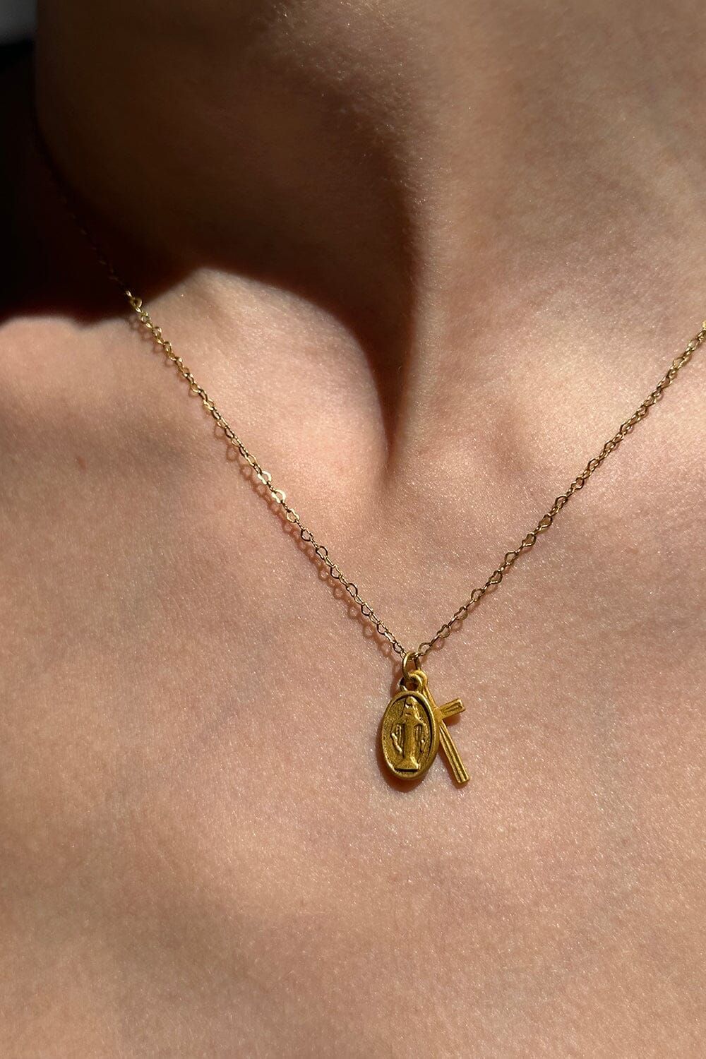 Mother Mary Cross Necklace sold by Brandy Melville product image thumbnail 3