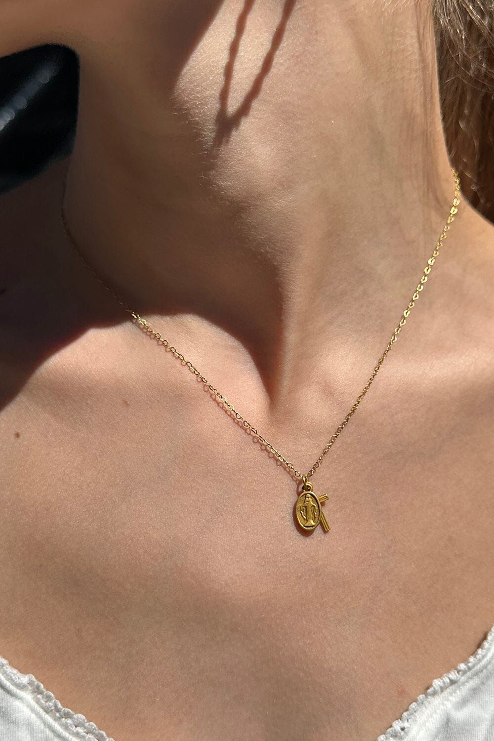 Mother Mary Cross Necklace sold by Brandy Melville product image thumbnail 2