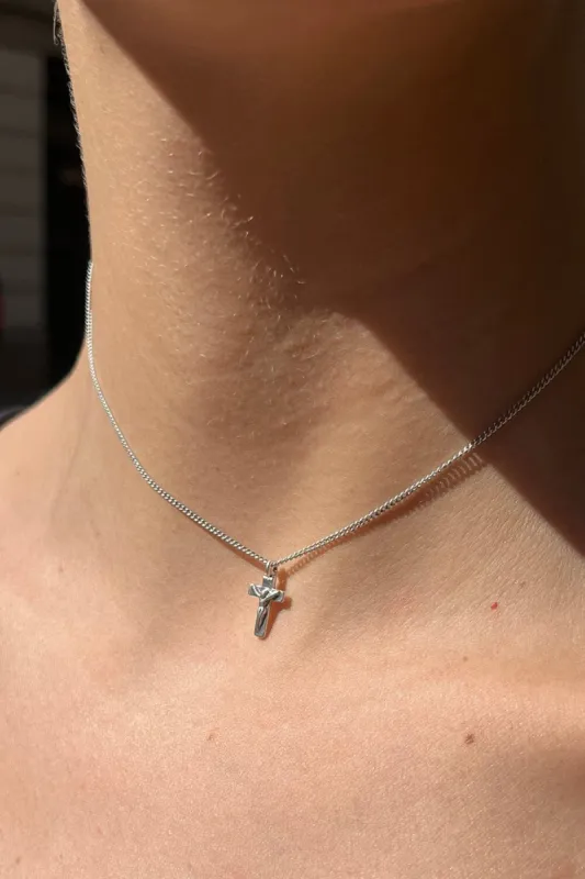 Silver Crucifix Choker sold by Brandy Melville