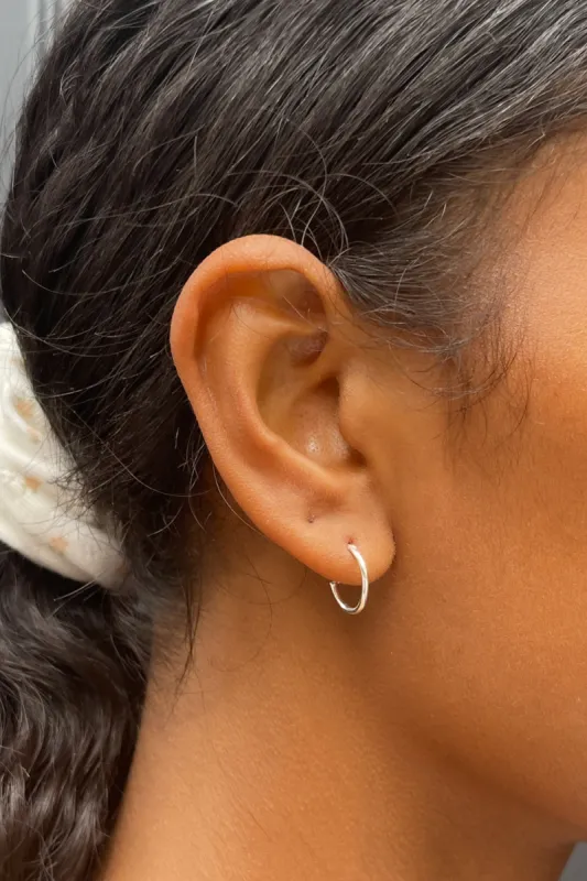 Sterling Silver Mini Infinity Hoop Earrings made by Brandy Melville