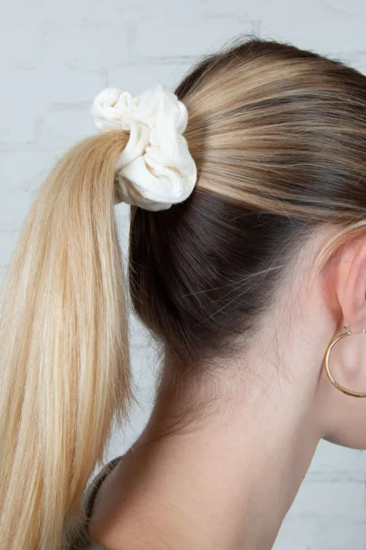 Heart Eyelet Scrunchie sold by Brandy Melville