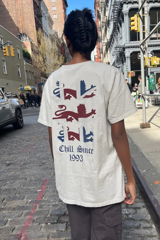 Penelope Chill Since Flag Top sold by Brandy Melville