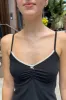 Archie Bow Tank sold by Brandy Melville